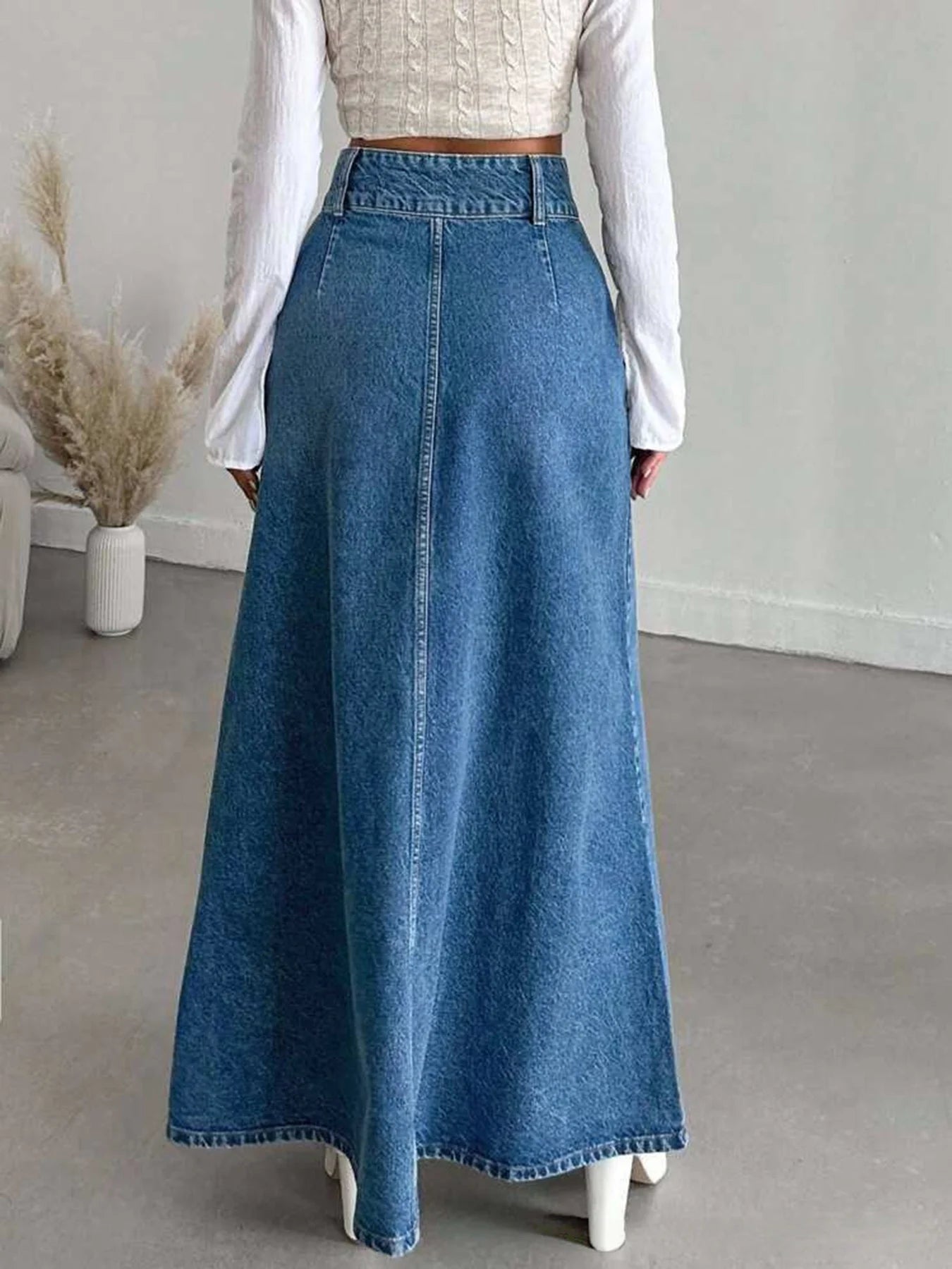 Women's long denim midi skirt for spring and autumn seasons. Suitable for various occasions such as daily wear, commuting, and g
