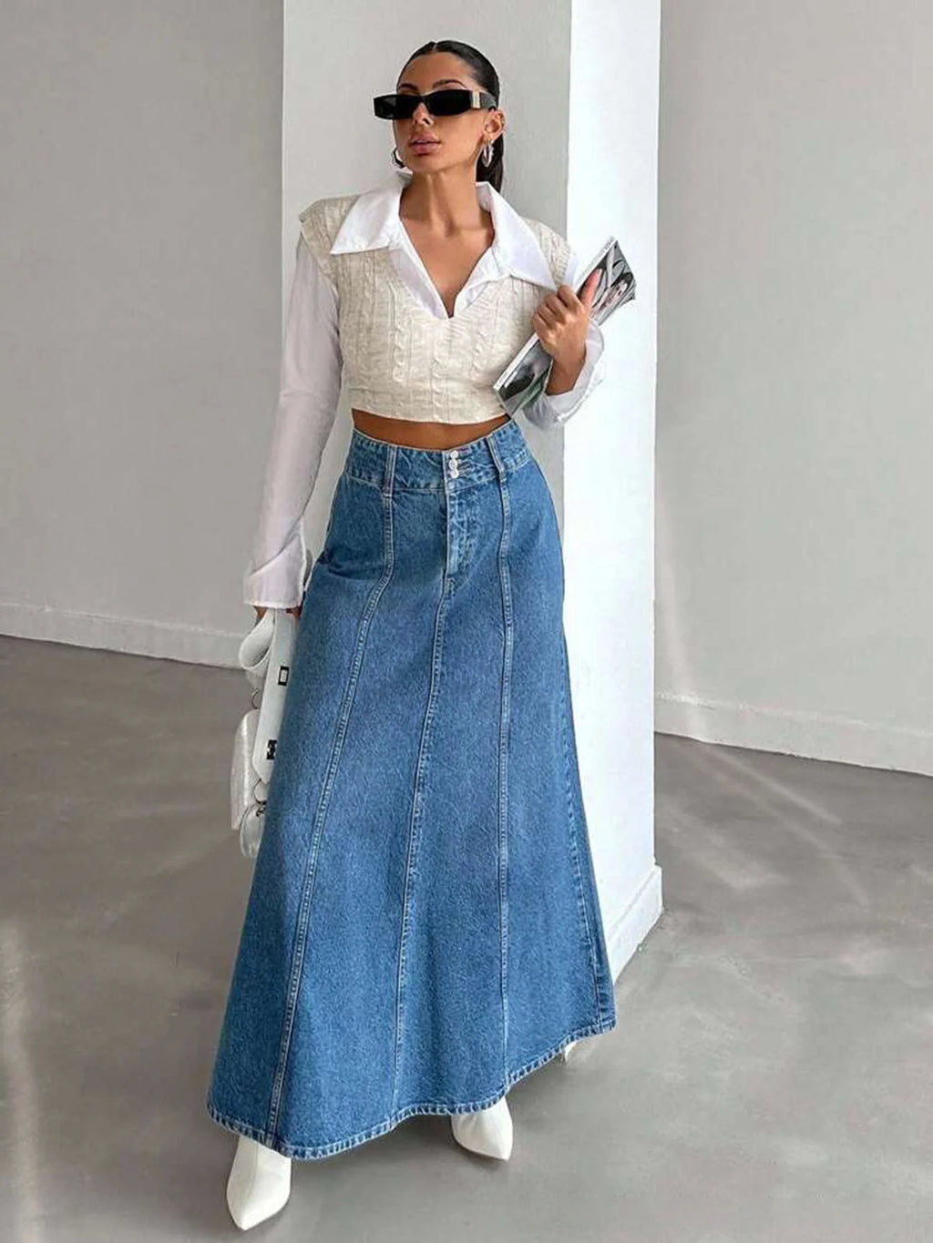 Women's long denim midi skirt for spring and autumn seasons. Suitable for various occasions such as daily wear, commuting, and g